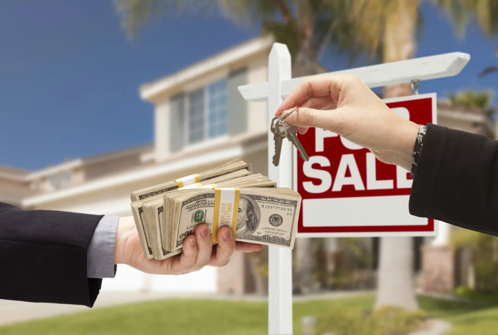 13511564 agent handing over keys buyer handing over cash for house scaled 1 scaled